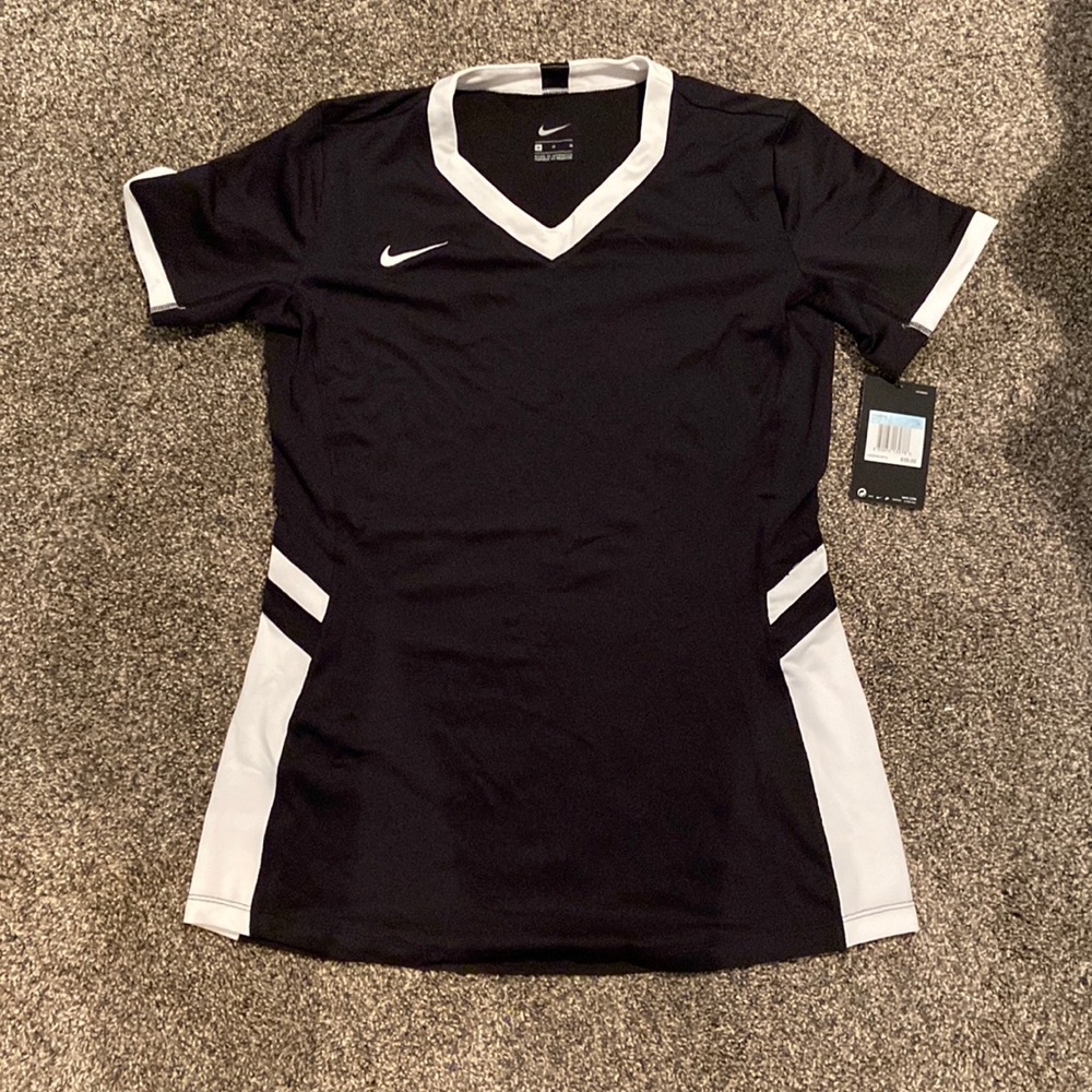 Womens Nike volleyball shirt, with venting.Dri-Fit. Various sizes.